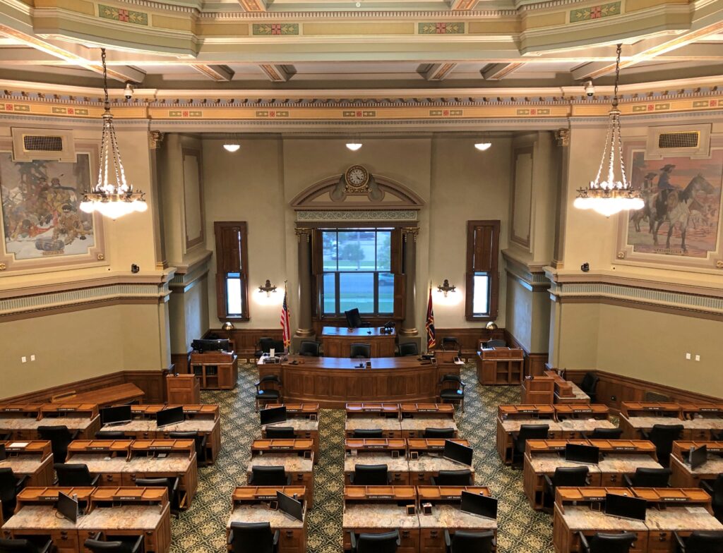 It faces a long avenue.